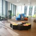 Nordea Bank - Market Street 7 | Product Seen: [Dojo Sidechair – Wood Seat, Customised Laminate Tabletop + Figure Leg, Lucy Side Table, Seed Modular Stool & Customised Curve Classic Booth]<br />